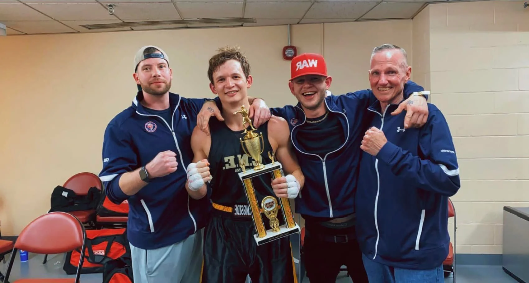 Gloucester Boxing Club team with trophy